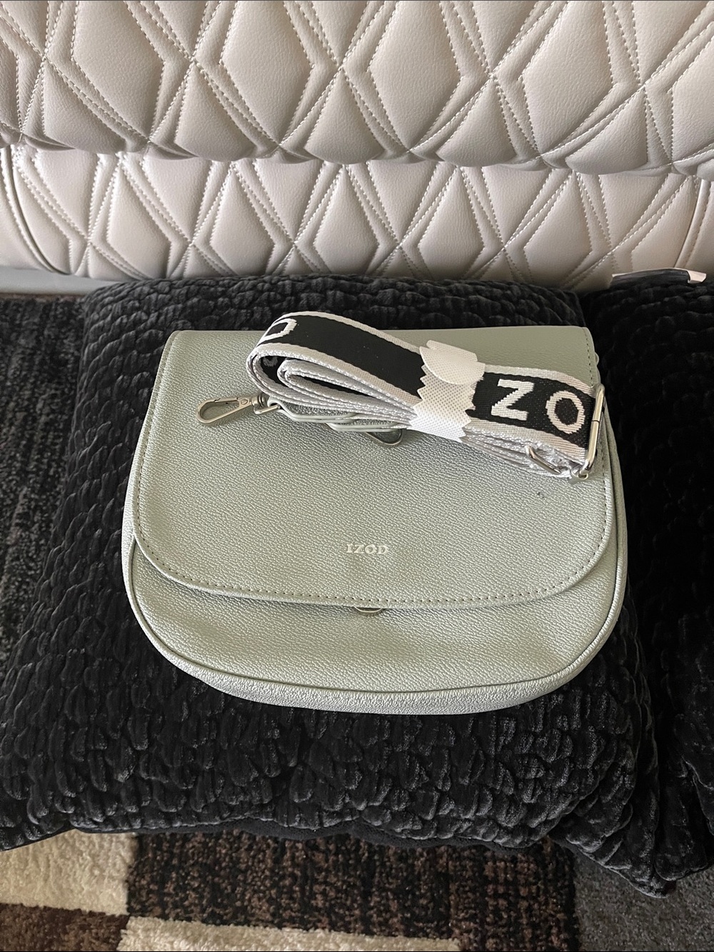 Izod sage green faux leather Crossbody  Bag with Branded Black-and-White Strap